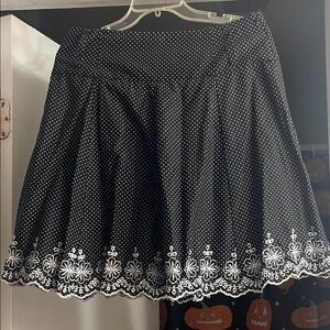 Elegant Black and White Skater Skirt with Floral Detail
